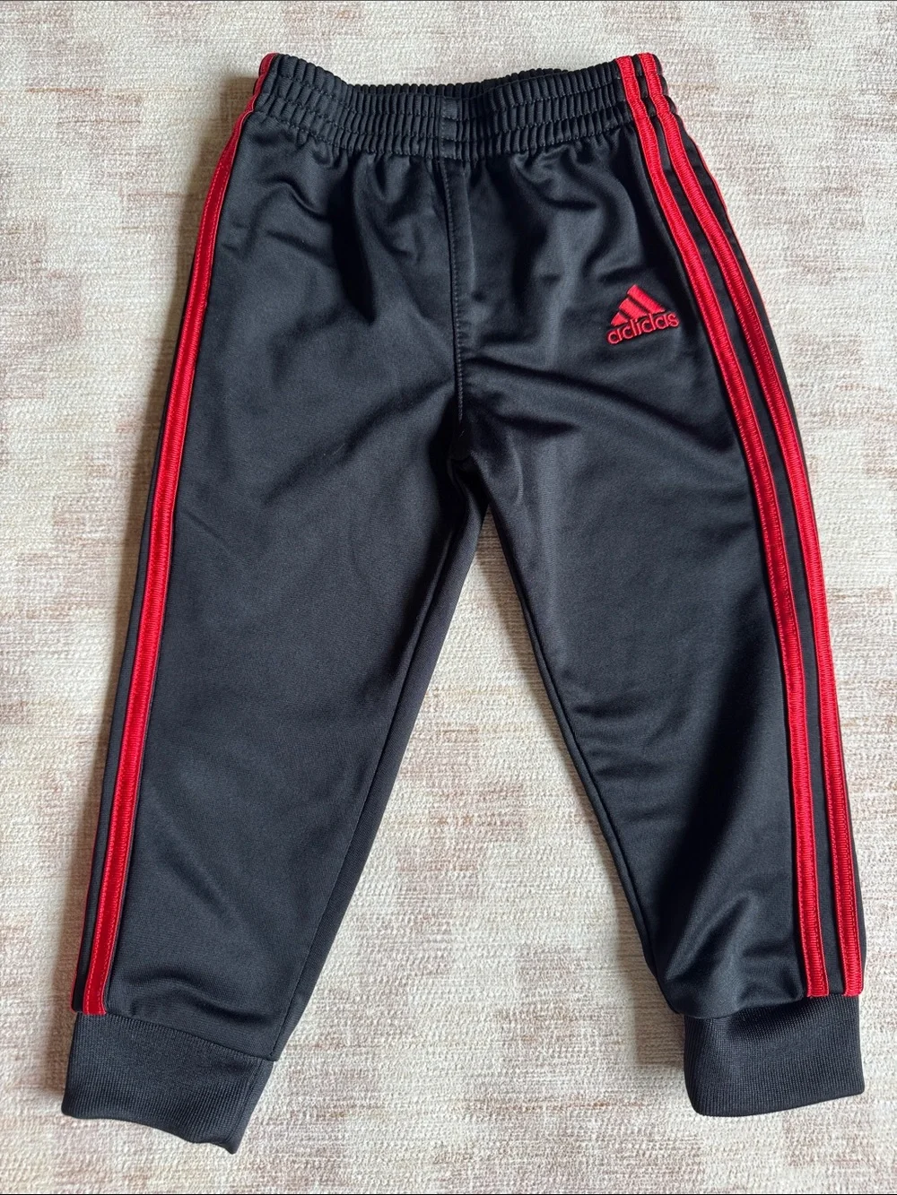 adidas Red Kids Tracksuit with Black Stripes and Accents size 18M